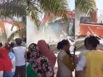 viral-video-istri-tua-hancurkan-rumah-pakai-alat-berat.jpg