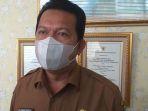zainal-arifin-kadiskes-riau.jpg