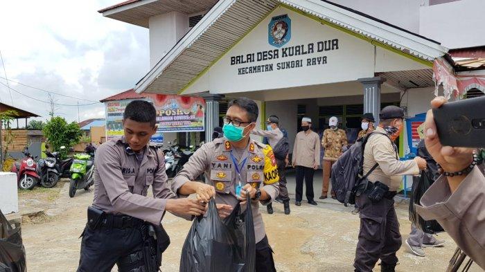 Polres Kubu Raya Salurkan Bantuan 1000 Paket Nasi Kotak ke Rumah-Rumah Warga