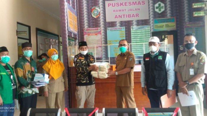 NU Peduli Covid-19 dan Gugus Tugas GP Ansor Serahkan Bantuan APD ke Puskesmas di Kabupaten Mempawah