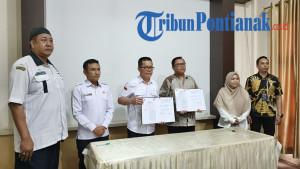 TANDATANGANI-KERJASAMA-10092555.jpg