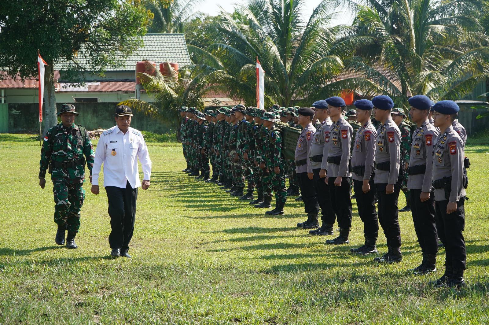 Satbrimob Polda Kalbar Berpartisipasi dalam Upacara Pembukaan TNI Manunggal Membangun Desa