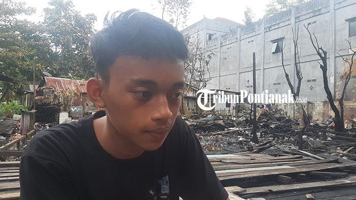 Geri-15-th-anak-korban-kebakaran-saat-ditemui-Tribun-d2354werf.jpg