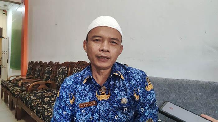 Kepala-Disperindagkop-UKM-Kota-Singkawang-Muslimin-18-Juli-2022.jpg