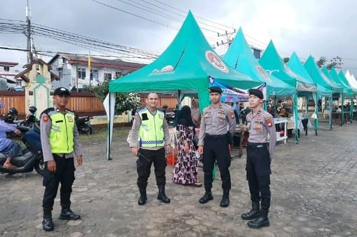 Personel Polres Singkawang Lakukan Pengamanan Pasar Juadah di Sejumlah Tempat