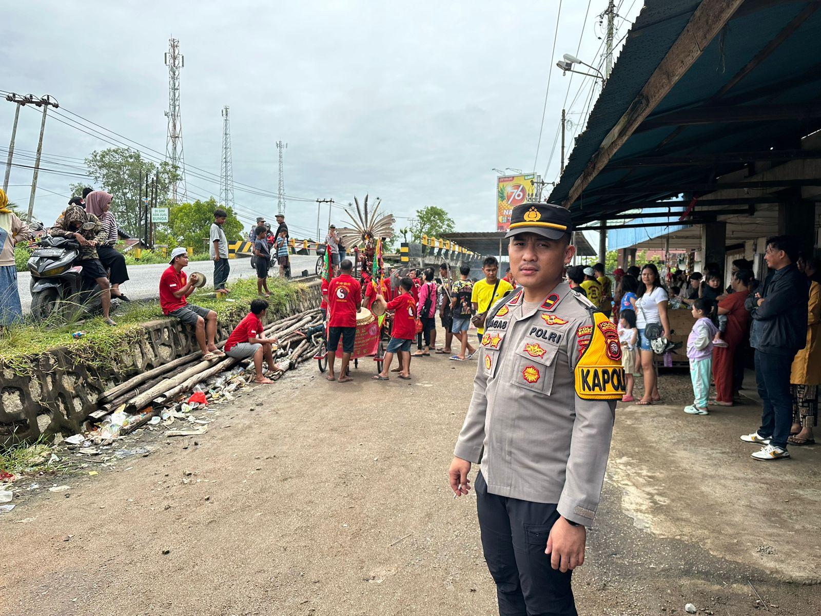 Kapolsek IPDA Bagas Pimpin Langsung Pengamanan Atraksi Tatung Cap Go Meh 2025 di Sungai Kunyit