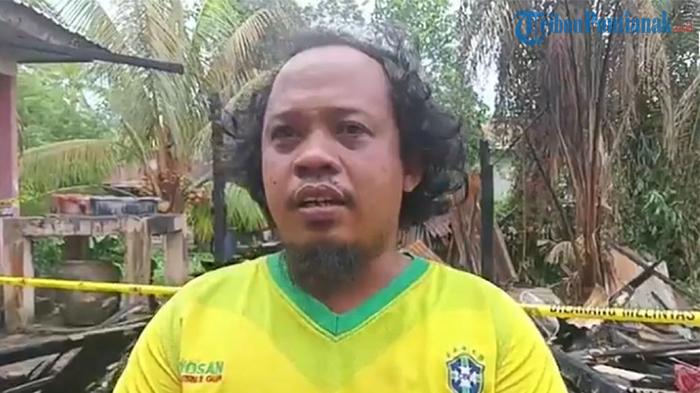 Saksi-mata-kebakaran-Indra-warga-Desa-Tebas-Sungai.jpg