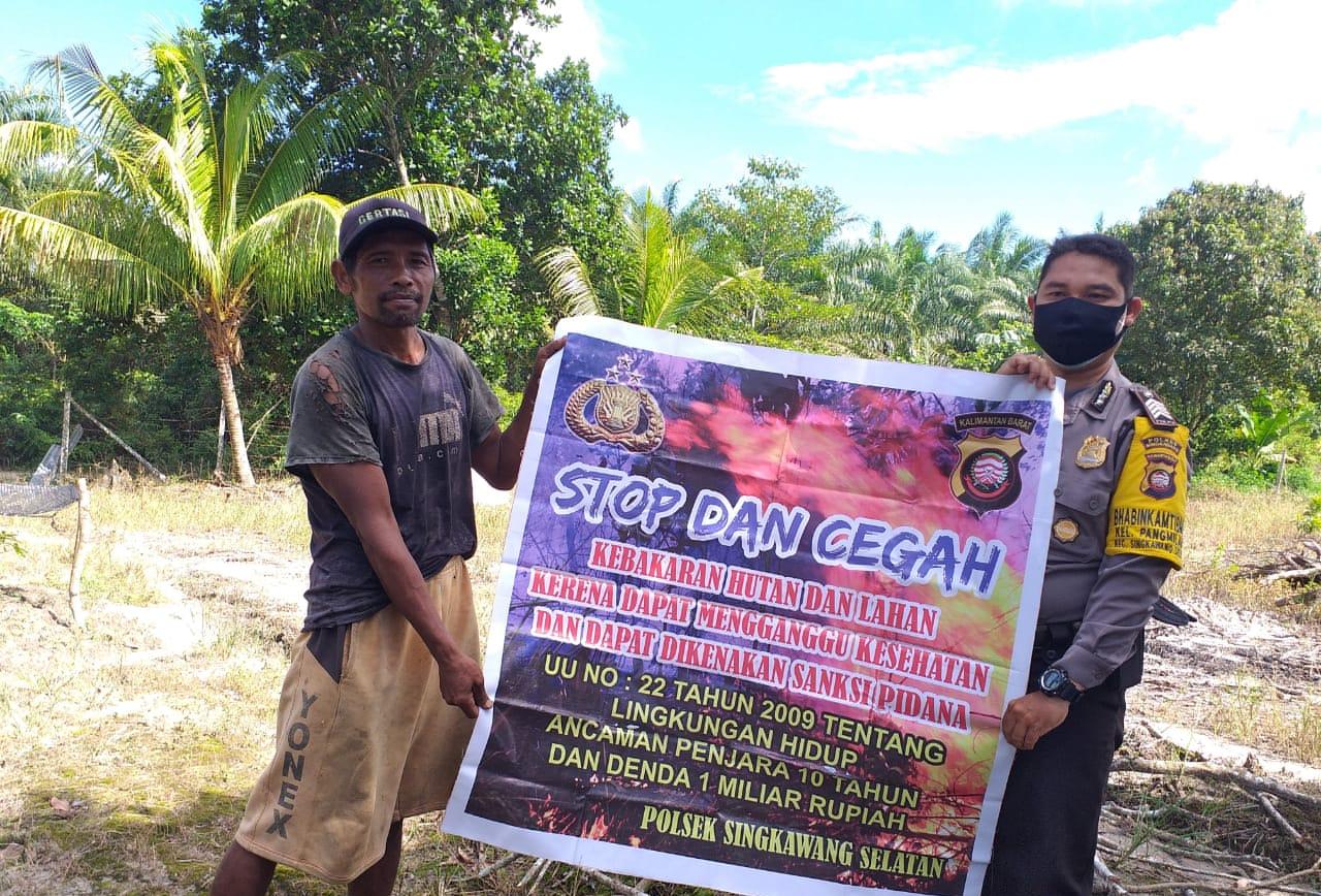 Bhabinkamtibmas Kelurahan Pangmilang Bripka Iswan Susanto Kampanye Pencegahan Karhutla
