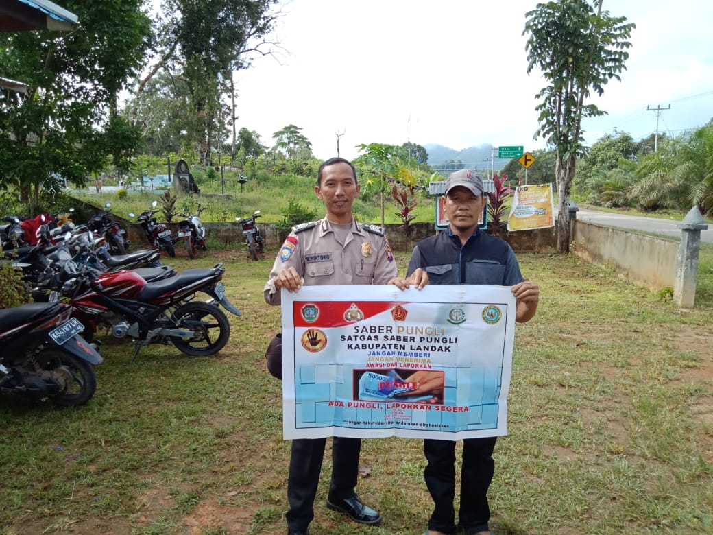 bhabinkamtibmas-polsek-menyuke-imbau-cegah-pungli-kepada-warga-desa-binaannya.jpg