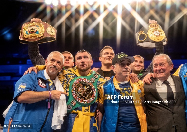 vasily-lomachenko-celebrates-victory-during-the-wba-wbo-wbc-lightweight-world-title.jpg