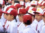 Aktifitas-siswa-SD-saat-melaksanakan-kegiatan-upacara-di-Sekolah-belum-lama-ini.jpg