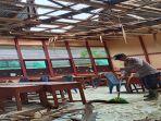 Anggota-Polsek-Binjai-Hulu-membersihkan-material-rerunt34trewdfg.jpg
