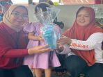 Astra-Motor-melakukan-kegiatan-CSRdi-Posyandu-Binaan-Perum-Korpri-di-Jalan-Sungai-Raya-1.jpg