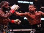 Demetrius-Andrade-memukul.jpg