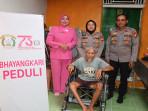 Kapolres Landak Salurkan Bantuan Kursi Roda, Peringati Hari Kesatuan Gerak Bhayangkari ke 73