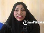 Direktur-Firman-Center-Indonesia-Erna-235rewf.jpg