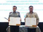 Direktur-Jenderal-Imigrasi-Silmy-Karim-pada-acara-penandatanganan-PKS-bersama-Bank-Mandiri-23421.jpg