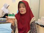 Hendrawati-52-peserta-Program-Jaminan-Kesehatan-Nasional-JKN.jpg