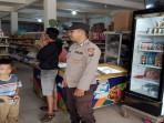 Patroli-dilakukan-oleh-anggota-Polsek-Kuala-Behe-Aiptu-F-Akbar-bersama-Bripka.jpg