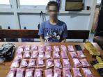Pelaku-berinisial-WA-saat-diamankan-bersama-barang-bukti-narkotika.jpg