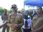 Penjabat-Pj-Bupati-Kayong-Utara-Alfian-meninjau-pendistribusian-paket-sembako-murah.jpg