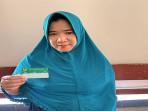 Rusmiati-45-Peserta-Program-Jaminan-Kesehatan-Nasional-JKN.jpg