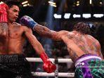 Ryan-Garcia-di-celana-hitam-bertukar-pukulan-dengan-Gervonta-Davis-di-celana-hijau-dan-ungu.jpg