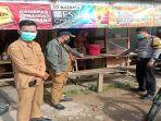 bhabinkamtibmas-polsek-sungai-pinyuh-datangi-lokasi-penemuan-bayi.jpg