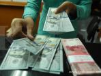 bi-keluarkan-aturan-pengelolaan-pinjaman-utang-luar-negeri.jpg
