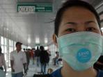 cara-memakai-masker-yang-benar_20150916_103202.jpg