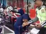 gigit-polisi_20180223_151420.jpg