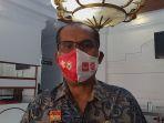 ginting-masker-merah.jpg