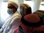habib-rizieq-dalam-pesawat-saudi-airlines-sv816.jpg