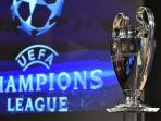 ilustrasi-trophy-liga-champions-uefa-afp.jpg