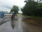 jl-nasional-ketapang-siduk-tepatnya-di-turunan-jembatan-pawan-ii_20180528_105240.jpg