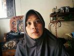 kerabat-korban-tenggelam-di-parit-masigi-izah-azizi.jpg