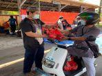 panitia-kurban-pln-up3-singkawang-menggunakan-motor-listrik.jpg