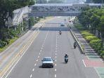 pengendara-melintas-di-jalan-jenderal-sudirman.jpg