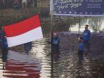 pengibaran-bendera-merah-putih-di-paret-sungai-nenas.jpg