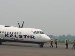 penumpang-pesawat-kalstar_20150910_195052.jpg