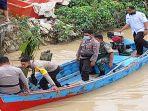 petugas-gabungan-melakukan-pencarian-korban-tenggelam-di-sungai-besar-desa-12wq.jpg