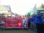 pj-sekda-kalbar-saat-melepas-bersama-sama-peserta-jalan-sehat-hari-tbc-internasional.jpg
