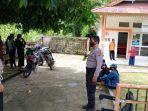 polisi-kawal-penyaluran-bst-di-kantor-pos-menjalin.jpg