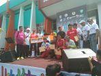 prosesi-penyerahan-hadiah-event-yok-kite-lari.jpg
