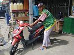 rahmani-75-salah-seorang-juru-parkir-di-jl-tanjungpura-as.jpg
