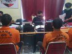 tiga-tersangka-penggelapan-17-unit-laptop.jpg