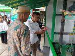 vice-president-pt-pegadaian-area-pontianak-sulaeman-memotong-pita-meresmikan.jpg