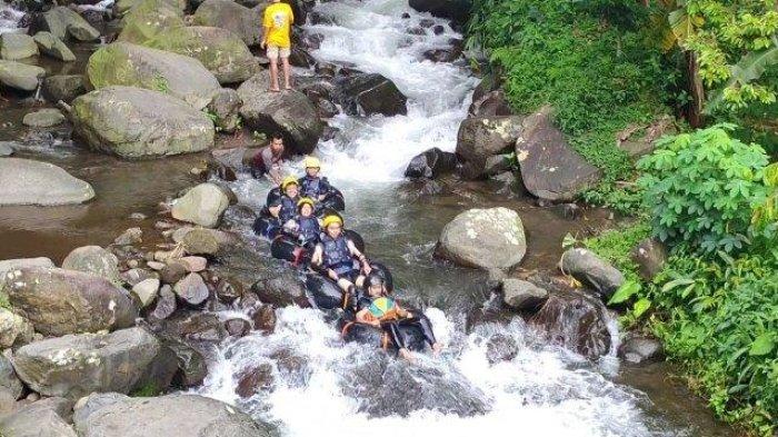 WISATA GARUT - River Tubing Ci Kaengan. ILUSTRASI (Foto: wisata river tubing Cikadongdong Majalengka. Smiling West Java merekomendasikan tiga spot river tubing yang bisa dijajal. Bermain di sungai yang tenang dan bikin rileks.)