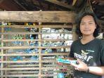 Idham-Hamdani-perajin-miniatur-perahu-Pangandaran-1.jpg