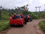 Petugas-BPBD-Kabupaten-Tasikmalaya-usai-bersihkan-material-longsor-di-tasik.jpg